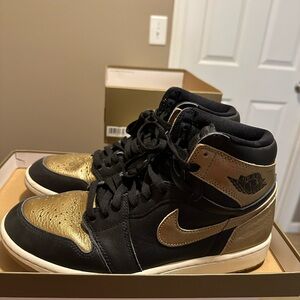 Nike Air Jordan Black and Gold Athletic Shoes